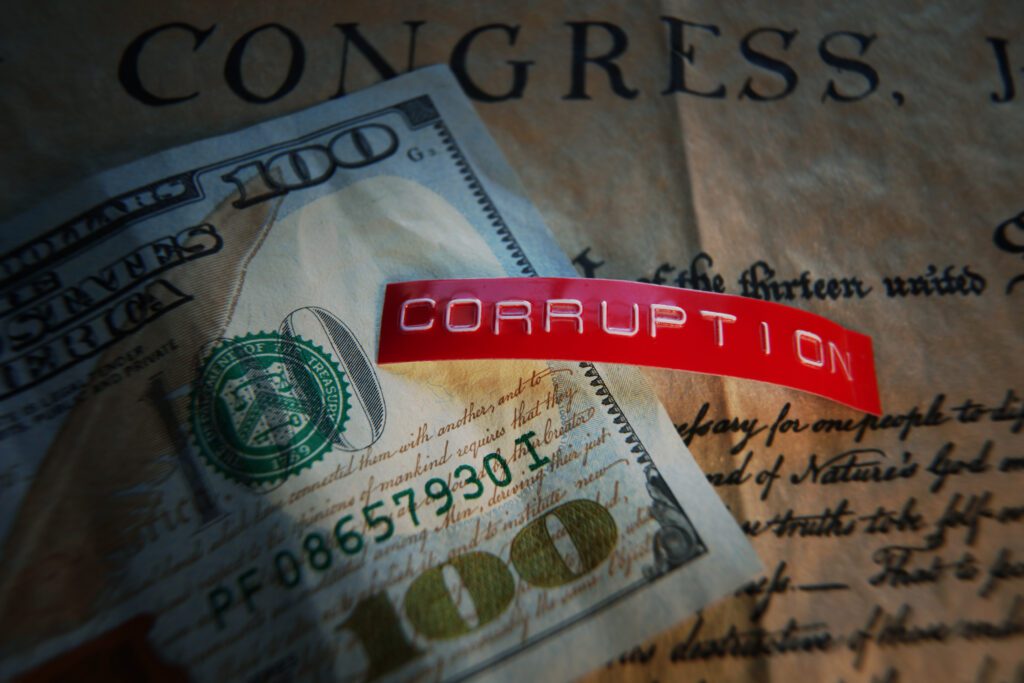 Money and corruption label on congressional document.